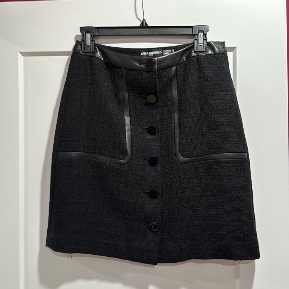 Karl Lagerfeld Paris button front black skirt. Faux leather trim. Size 2